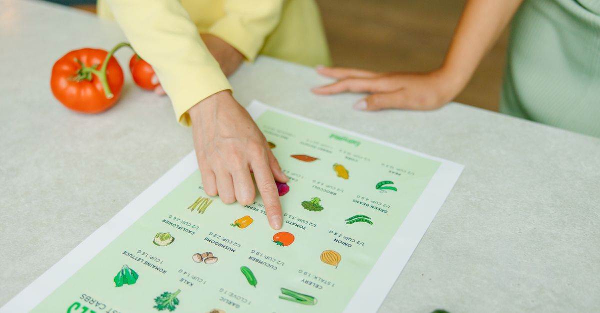 A bright kitchen counter with a tablet showing a family shopping list and a reusable grocery bag nearby.